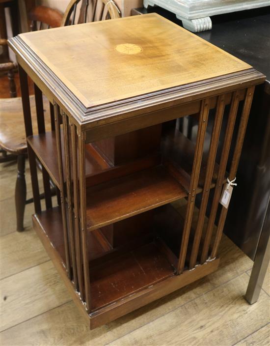 An Edwardian inlaid mahogany revolving bookcase W.48cm